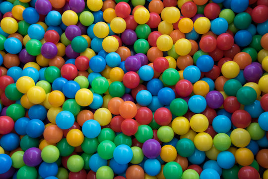 Colored balls in a play area for children image for background use with copy space