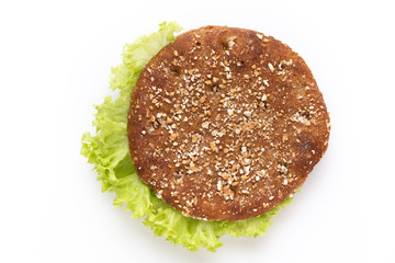 Sandwich with salami sausage on white background.