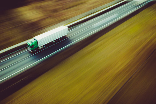 Fast Green Truck - Panning By Drone