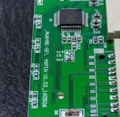 Close-up of an electronic component, the inner workings of a card reader for the computer