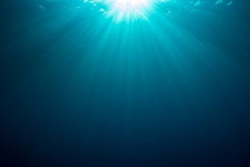 Sunburst in blue ocean