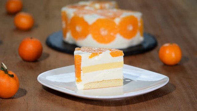 Piece of homemade tangerine mousse cake.