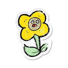 Obraz premium retro distressed sticker of a cartoon flower with face