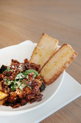 Baked eggplant Aubergine with crispy bacon and toast
