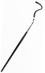 Question mark painted on white sheet with painter's brush on the diagonal