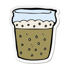 sticker of a cartoon glass of beer
