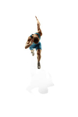 Young caucasian man running isolated on white studio background. One male runner or jogger....