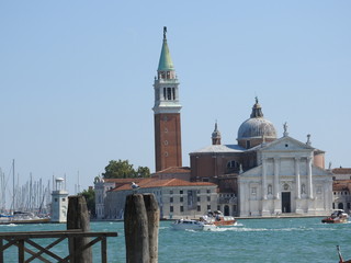 Beautiful Venetian street and canals on a summer day, Italy