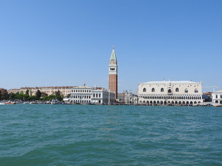 Fototapeta na wymiar Grand Canal with St Marks Campanile bell tower and Palazzo Ducale, Doge Palace, in Venice, Italy
