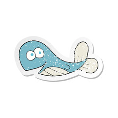 retro distressed sticker of a cartoon whale