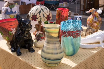 glass vintage vases at street market, Cremona, Italy