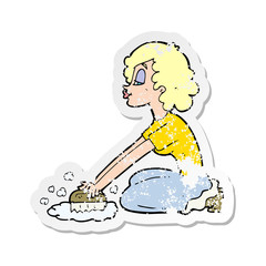 Naklejka premium retro distressed sticker of a cartoon woman scrubbing floor
