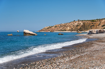 Fototapeta na wymiar Petra tou Romiou or Aphrodite Rock Beach, one of the main attractions and landmarks of Cyprus island.