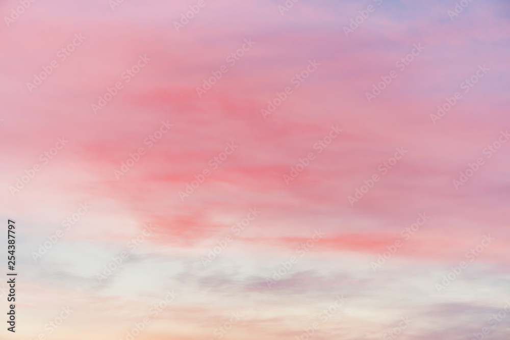 Wall mural sunset sky with multicolor light clouds. colorful smooth sky gradient. natural background of sunrise