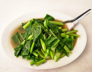 Chinese Kale Stir Fry with vegetable in oyster sauce .