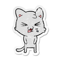 distressed sticker of a cartoon hissing cat