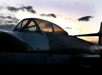 Fototapeta na wymiar Gloster Meteor early jet fighter cockpit in late evening light.