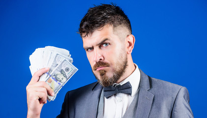 The initial loan. Business startup loan. Bearded man holding cash money. Rich businessman with us...