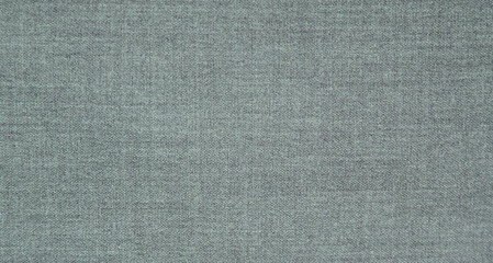 Fototapeta na wymiar Grey Fabric Texture Background of Empty Gray Color Cloth Material. Fashion Clothing Fragment, Flat Lay Top View of Smooth Seamless Grey Fiber Pattern