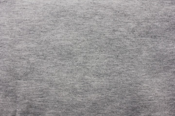 Grey fabric texture background of faded gray colored grungy cloth. Surface material design of seamless linen pattern of empty sheet or backdrop, blank canvas and copy space template