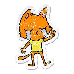 distressed sticker of a crying cartoon cat