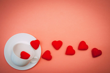 red hearts on pink background