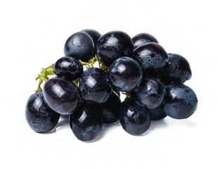 Fresh bunch of black grapes. White isolated background. Close-up. Side view.