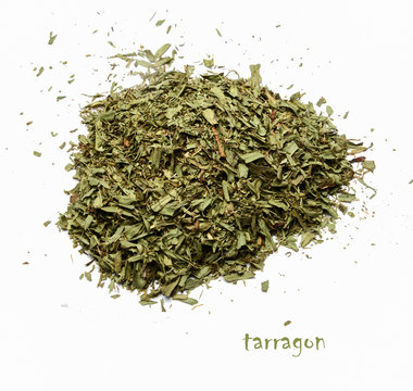 A pile of dried chopped tarragon on a white isolated background. View from above.