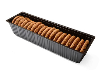 Oatmeal cookies in plastic packaging. White isolated background. Close-up. Side view.