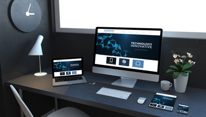 navy blue responsive devices on desktop showing technology website