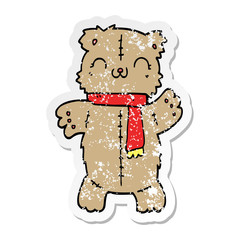 distressed sticker of a cartoon teddy bear