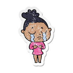 distressed sticker of a cartoon crying woman