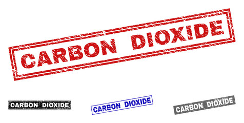 Grunge CARBON DIOXIDE rectangle stamp seals isolated on a white background. Rectangular seals with distress texture in red, blue, black and gray colors.