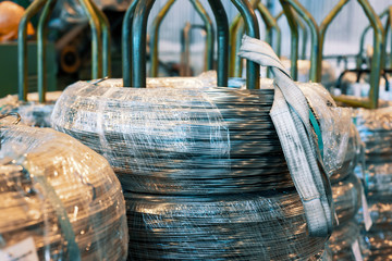Industrial warehouse of cold rolled wire. The wire coils are stacked off the stack