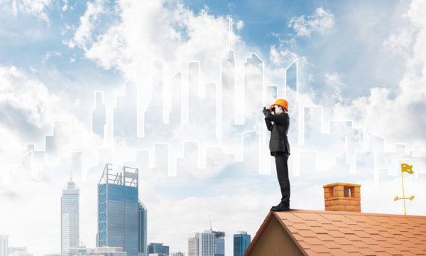 Engineer man standing on roof and looking in binoculars. Mixed media