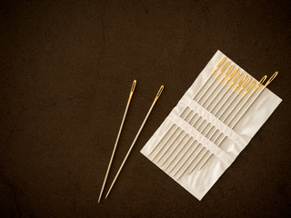 Sewing needle on a black background