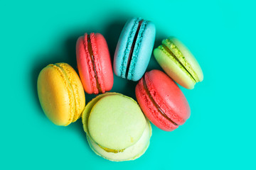 Top view multicolored delicious pasta on turquoise background