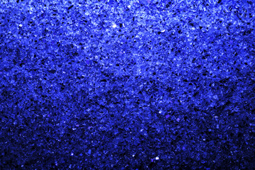 Obraz premium Dark abstract blue background of stones