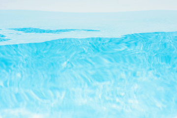 Transparent underwater texture and background of pool water