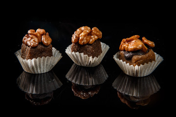 three healthy useful organic handmade candies with walnuts