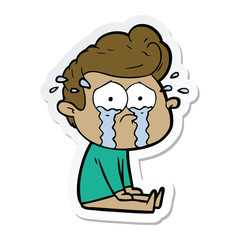 sticker of a cartoon crying man