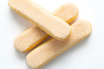 Italian savoiardi cookies on white background. Cookies Savoyardy for making Tiramisu. 