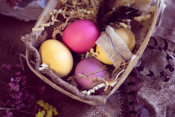 colorful easter eggs in a basket