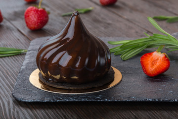 French mousse cake covered with mirror glaze