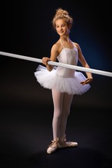 Smiling ballet student by ballet bar © nyul