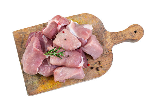Fresh pieces of raw veal meat for French Blanquette. Image isolated on white studio background.