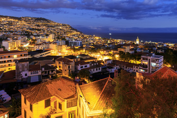 Fototapeta na wymiar Beautiful cityscape panorama of the city Funchal, on the island Madeira at night in summer