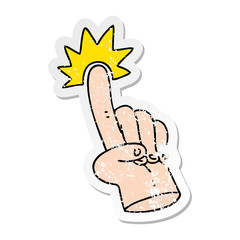 distressed sticker of a pointing finger quirky hand drawn cartoon