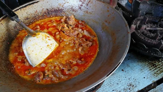 Thailand food ( Spicy Beef curry ) Stir fried Beef or pork with Curry spicy delicious in pan . Most popular menus and recommend in the country of Thailand.