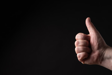 Thumbs Up Black Background